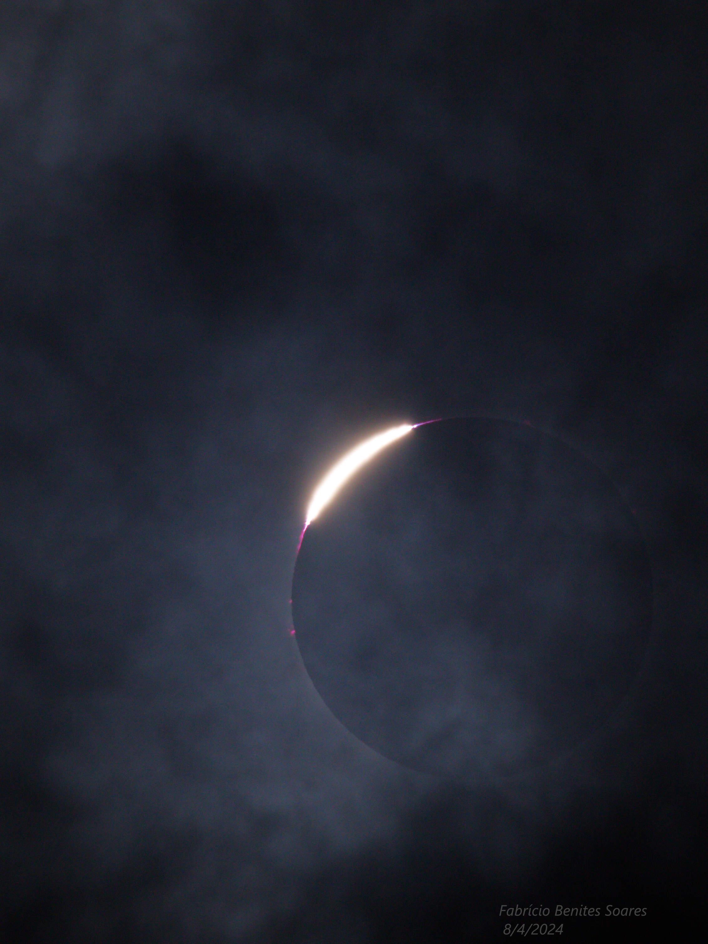 Eclipse Prelude: A Ring of Light Through the Veil of Clouds